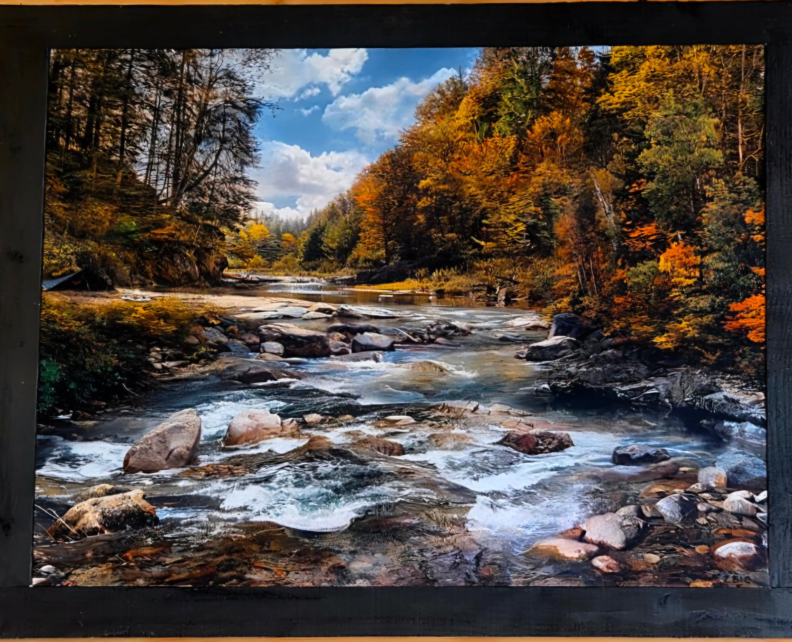 River running through Fall leaves on Fabric